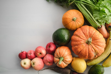 flat lay of fresh fruits and vegetables for background. Different fruits and vegetables for eating healthy. 