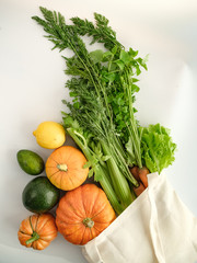 zero waste food shopping. eco natural bags with fruits and vegetables in tote, eco friendly, flat lay.