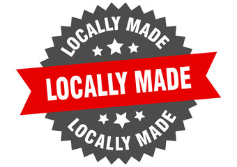 locally made sign. locally made red-black circular band label
