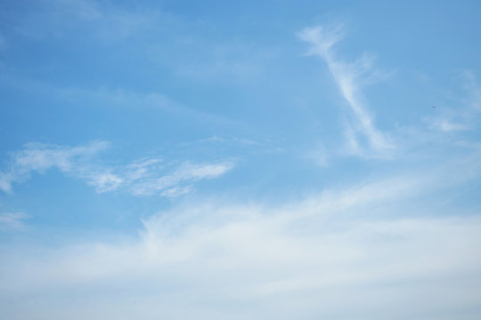 Cirrostratus cloud on beautiful blue sky , Fluffy clouds formations at tropical zone