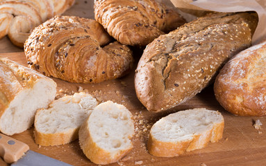 slices of wheaten bread on wooden surface