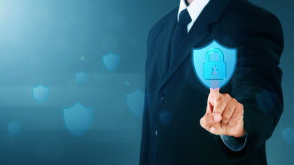 Man without Head touching Lock Shield on the visual screen. Security Concept.