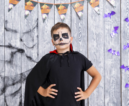 Scary young boy in halloween costume