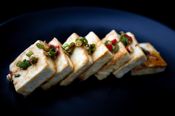 Fried Tofu with Soy Sauce and chillies which is called Dubu Jorim in Korea