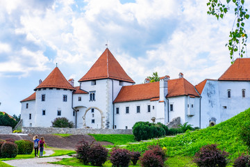 Obraz premium City park and old castle in Varazdin city, Croatia, sunny summer day