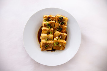 Fried Tofu with Soy Sauce and chillies which is called Dubu Jorim in Korea
