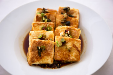 Fried Tofu with Soy Sauce and chillies which is called Dubu Jorim in Korea