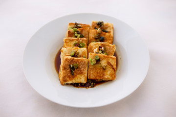 Fried Tofu with Soy Sauce and chillies which is called Dubu Jorim in Korea