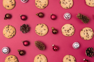 Red Christmas Background with Cookies Red Silver and Brown Christmas Balls and Cones Christmas Holiday Background Top View Flat Lay