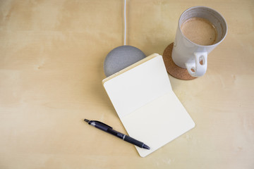 Ai speaker. Smart home device with note pad paper for making notes.