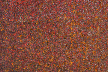 Rusty iron surface. Dark background or wallpaper. Macro