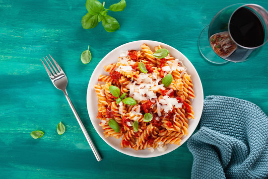 healthy fusilli pasta with tomato sauce parmesan basil - Powered by Adobe