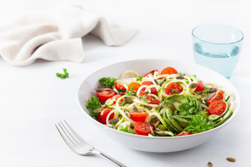 vegan ketogenic spiralized courgette salad with avocado tomato pumpkin seeds