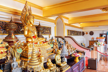 Gilded Buddha statue inside Wat Saket temple, Bangkok, Thailand