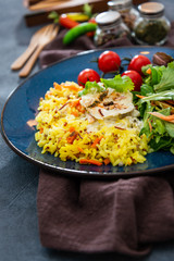 Andalusian fish, saffron rice with vegetables
