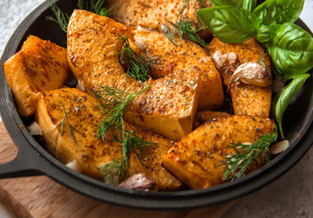 Grilled pumpkin with spices and garlic. Vegetarian dish. Lean food. Food Photography