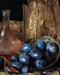 Plum. Fresh plum. Harvest. fresh blue plums on a dark table. Autumn harvest of plums. healthy eating concept. Food Photo