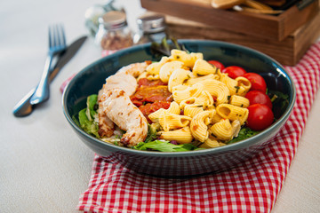 pasta and chicken on the table
