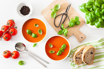 tomato soup flat lay on white backgorund