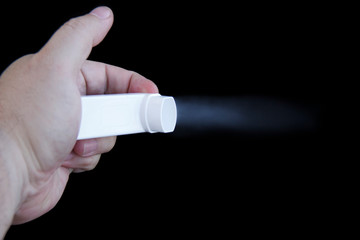 spray the flu medicine from the inhaler