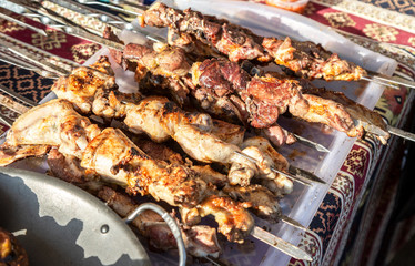 Grilled appetizing kebab on metal skewers