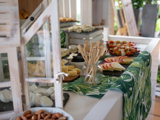 table set up with different types of food in a restaurant