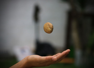 stone floating in the air on hand