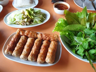 grilled sausages with potatoes and salad