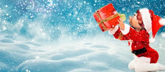 Happy boy with gift. Christmas banner with 3d model