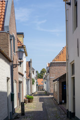 Fototapeta na wymiar Rozemarijnsteeg (rosemary alley) at the city of Elburg, Gelderland, NLD