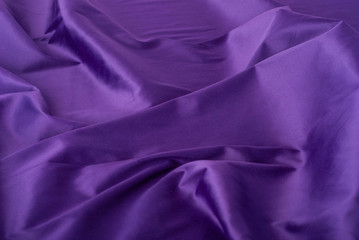 Fototapeta premium Purple Elegant fabric texture, abstract backdrop and modern pastel colours concept - Purple soft silk waves, flatlay background