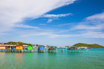 Fototapeta na wymiar The village of fisherman in the bay of Thailand.