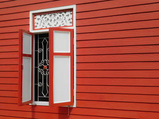 Fototapeta premium Red and white wood window exterior of Thai home style. Thai traditional culture.