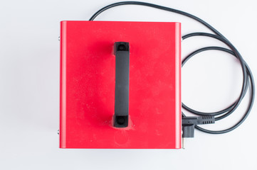 Old and dirty red electric heater isolated on white background.Copy space