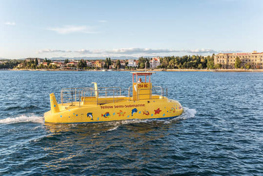 ZADAR, CROATIA - 11 JULY,2017: Walking Yellow submarine sailing on the waves of the Adriatic Sea.