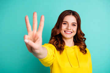 Photo of wavy curly charming fascinating gorgeous girlfriend smiling toothily showing you three fingers sign isolated over turquoise vivid color background - obrazy, fototapety, plakaty