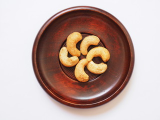above of diet food, clean eating with cashew nuts on wooden plate