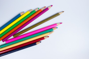 Many wood paints that have been used already are arranged in a rocket-like manner. on the white background