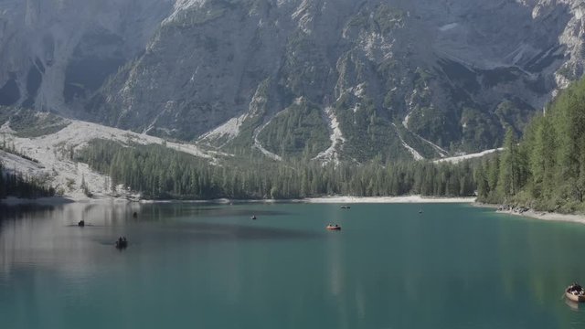 Boats on the Mountain Lake Aerial 4K In Dolomites Lago di Braies Ready for Grade.Italy Dolomites 4k Footage Flat Profile Ready For Grading. 