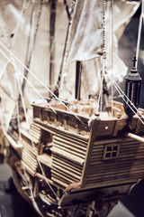 Fototapeta na wymiar close up of nautical old ship model reproduction miniature of galleon