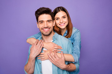 Portrait of lovely romantic spouses hug piggyback have wonderful honeymoon date feel tender support trust wear trendy stylish clothes isolated over violet color background