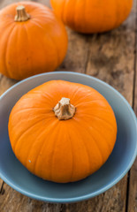 Pumpkins on wooden table
