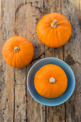 Pumpkins on wooden table