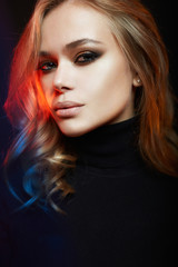 beautiful woman in color lights. colorful girl
