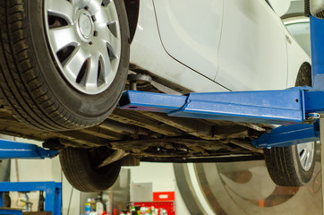 Down view of car Hydraulic lift machine 