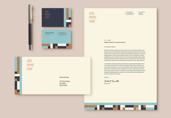 Stationery Set Layout with Blue and Tan Elements