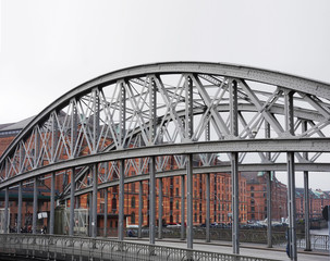 A bridge over a canal in the Speicherstadt in Hamburg Germany