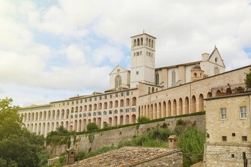 Fototapeta na wymiar Basilica of Saint Francis of Assisi with Sacro Convento of Franciscan friary, Umbria, Italy.