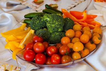 Plate with Fresh Vegetables - broccoli, peppers and tomatoes