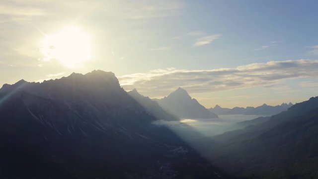 Mountain Sun Rays Aerial View In 4K In Dolomites Drone Fly Footage.Italy Dolomites 4k Footage Drone Shot In UHD 4K